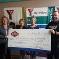 The Belleville Police Association makes a contribution to the YMCA Strong Kids campaign.